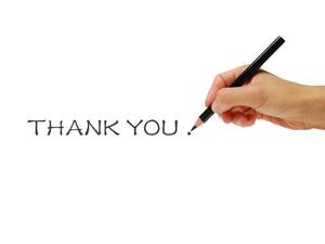 Hand holding pencil to write PPT thank you picture